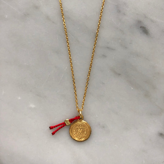 Silver-plated gold necklace with a coin