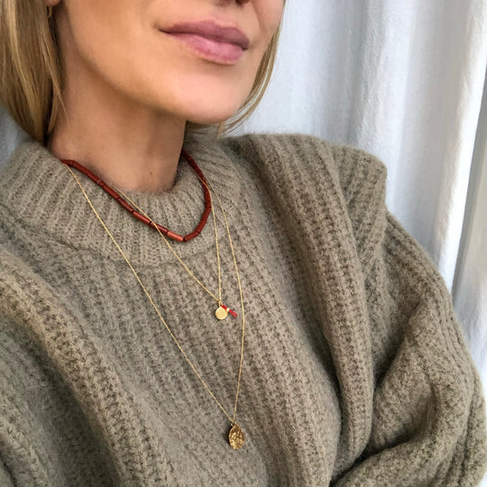 Silver-plated gold necklace with a coin
